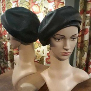 A handsome black leather  6-sectioned banded brim "beret" style hat.